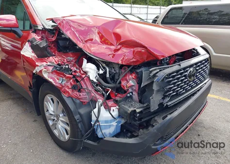 2022 Toyota Corolla Cross Le z USA, uszkodzony, nr VIN 7MUBAABG2NV036630